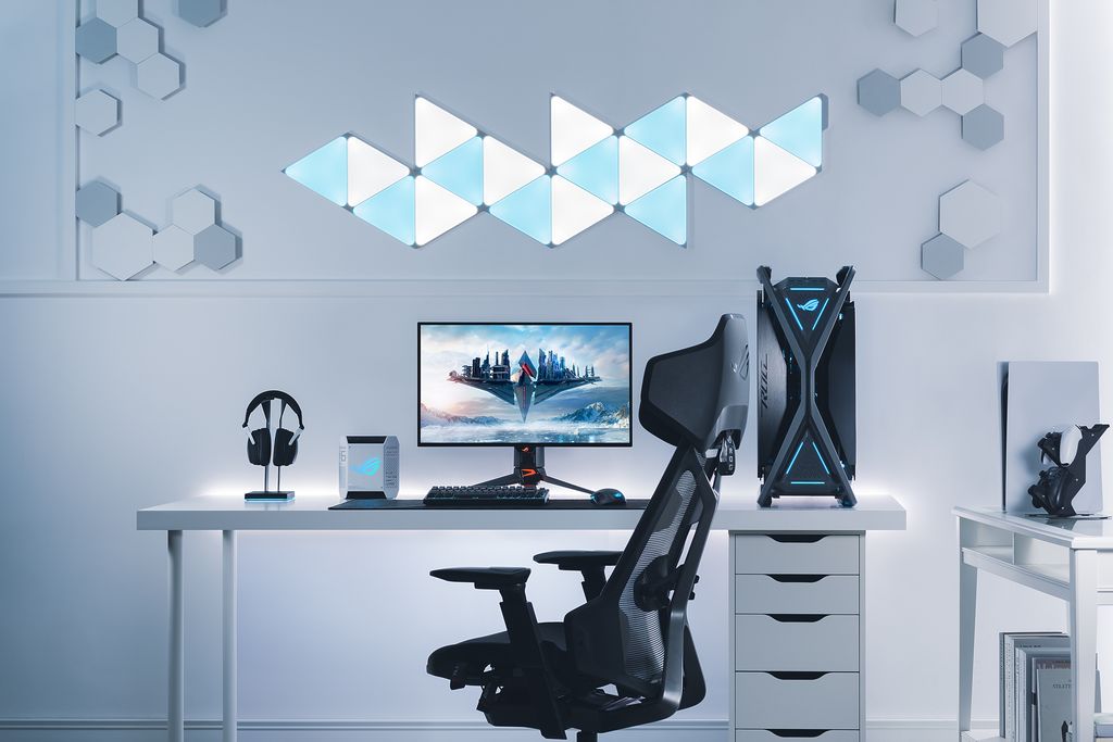 ASUS ROG Swift OLED PG27AQDM monitor, lifestyle/scenario photo on a gaming desk setup